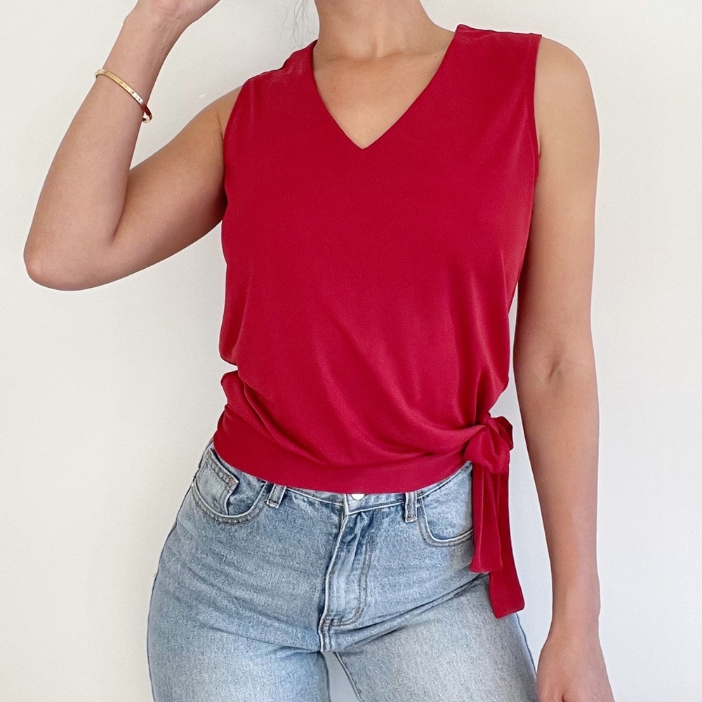 Red sleeveless shirt